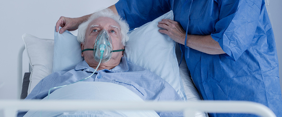 Patient wearing an oxygen mask